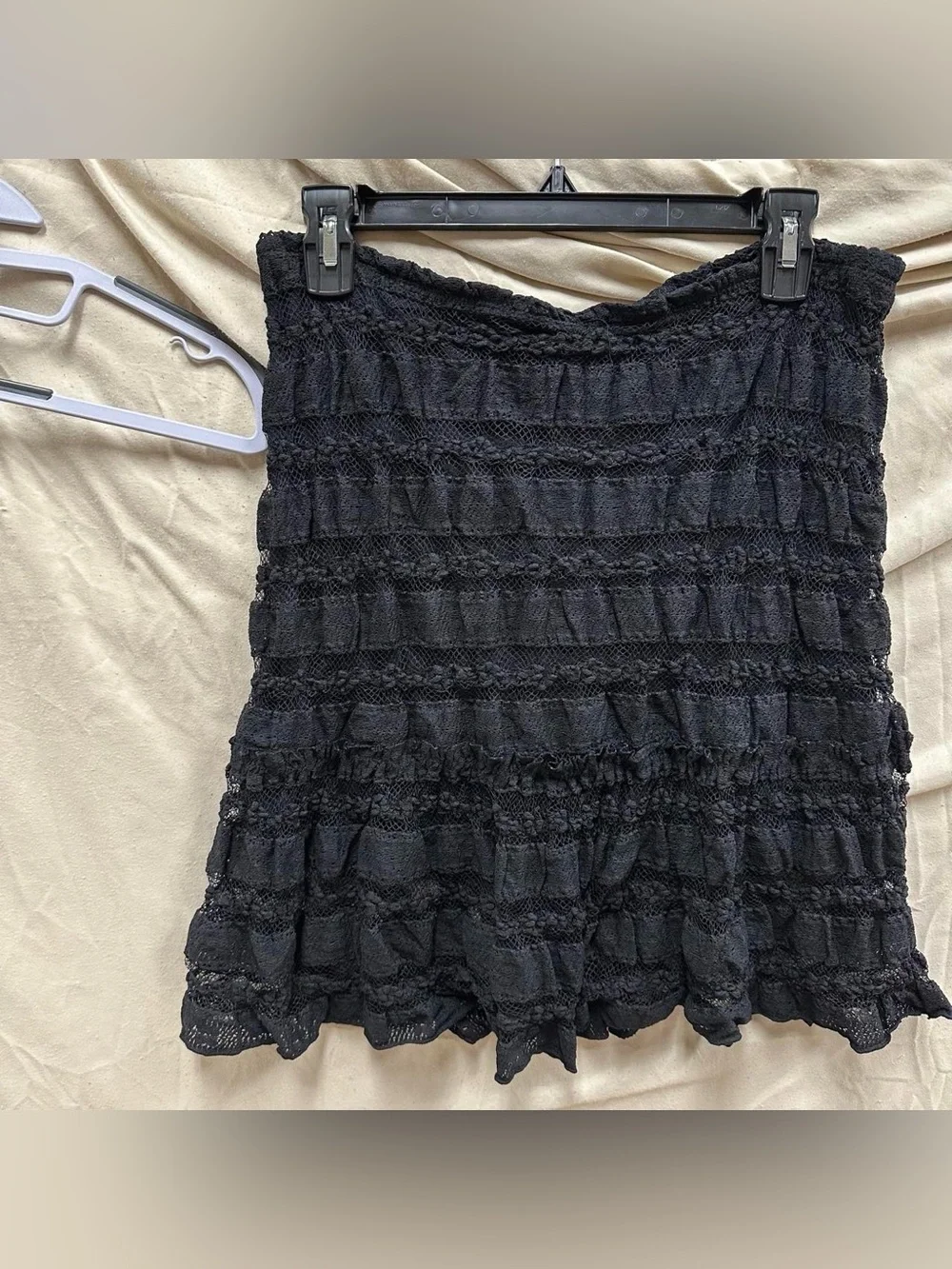 Guess branded Black frilly short midi skirt.